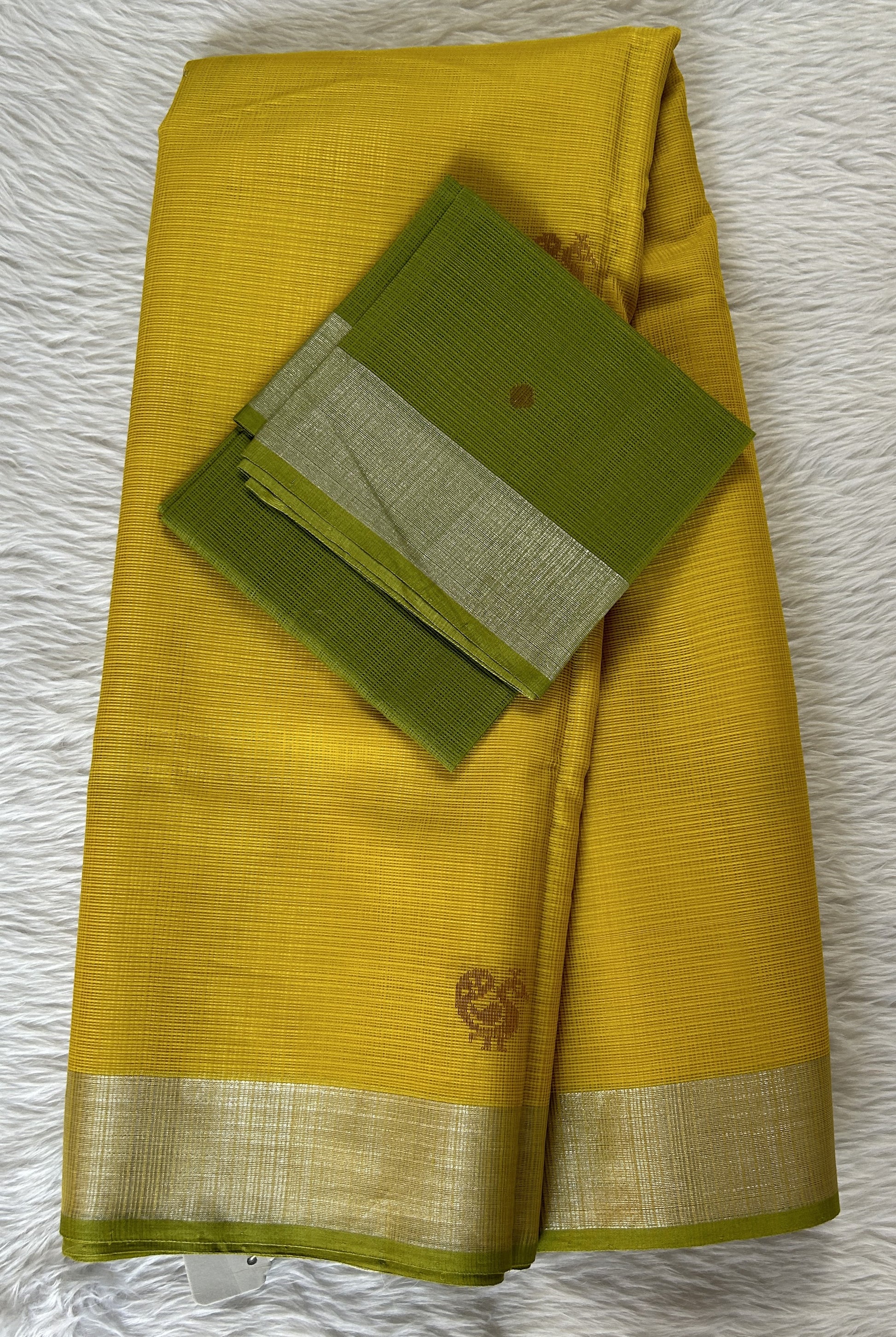 Zarikota saree Yellow colored Saree complemented with a Silver Zari border. - Sampradaya Designer Studio