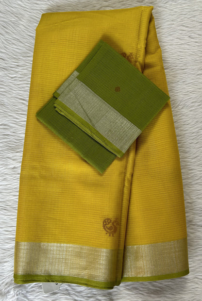 Zarikota saree Yellow colored Saree complemented with a Silver Zari border. - Sampradaya Designer Studio