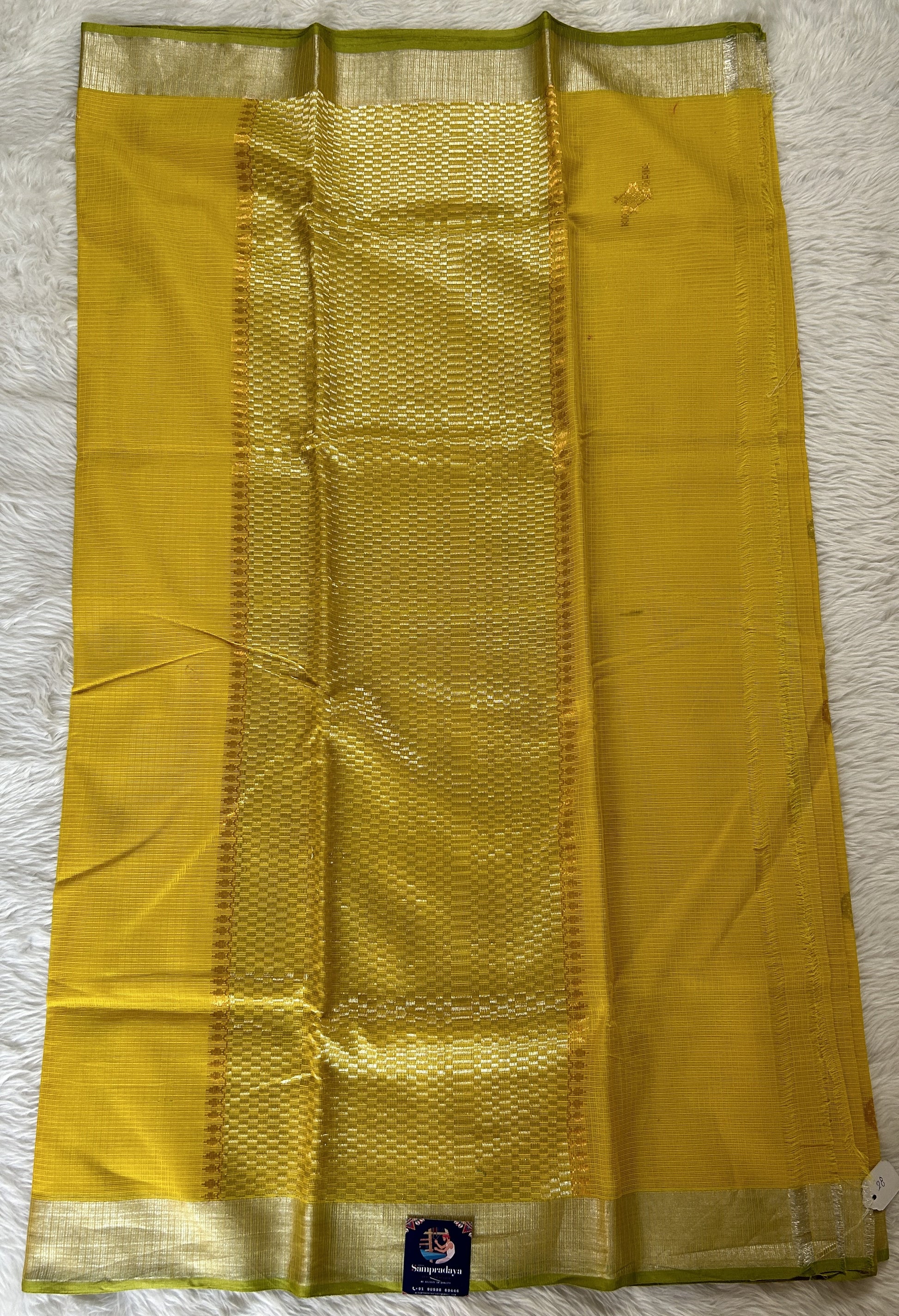 Zarikota saree Yellow colored Saree complemented with a Silver Zari border. - Sampradaya Designer Studio