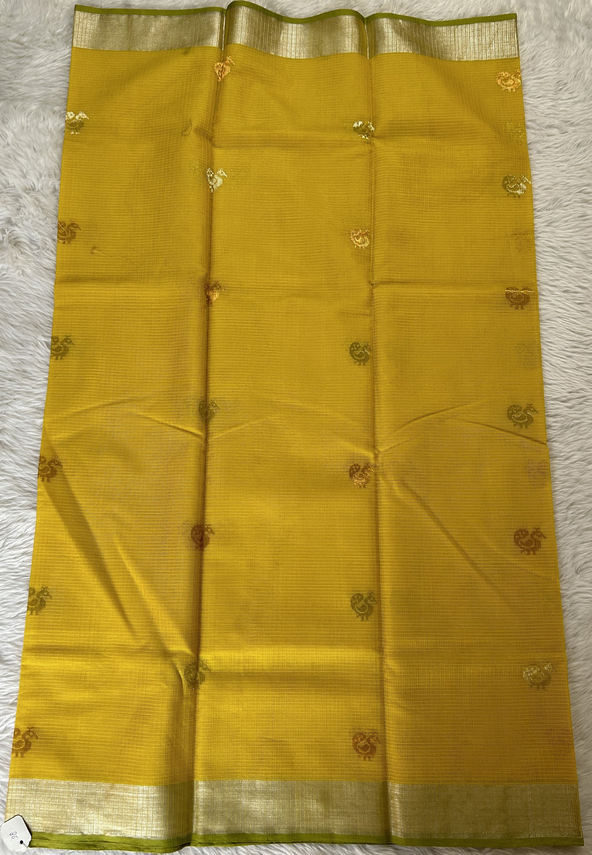 Zarikota saree Yellow colored Saree complemented with a Silver Zari border. - Sampradaya Designer Studio