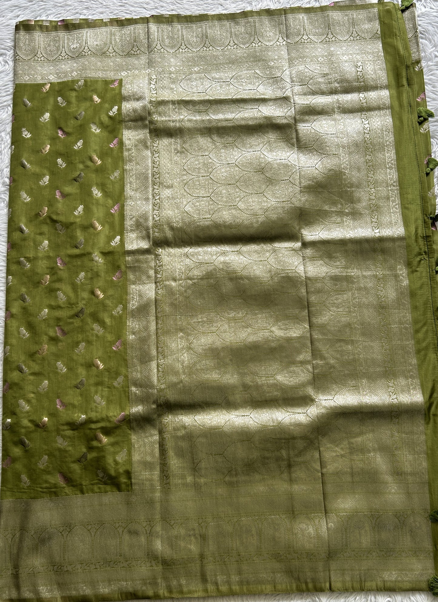 Semi Georgette Saree Olive Green Colored Complemented with a Zari Border. - Sampradaya Designer Studio