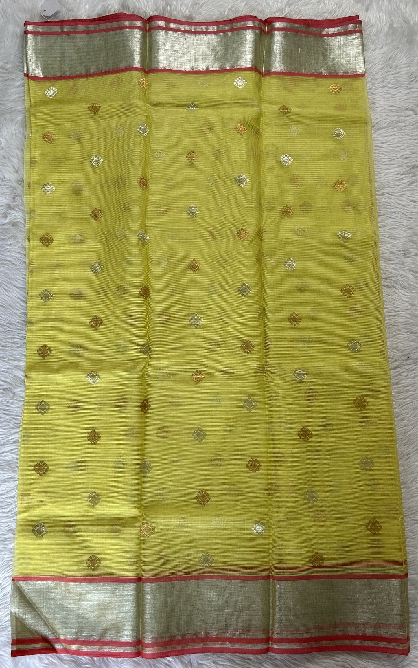 Zarikota saree Yellow colored Saree complemented with a Silver Zari border. - Sampradaya Designer Studio