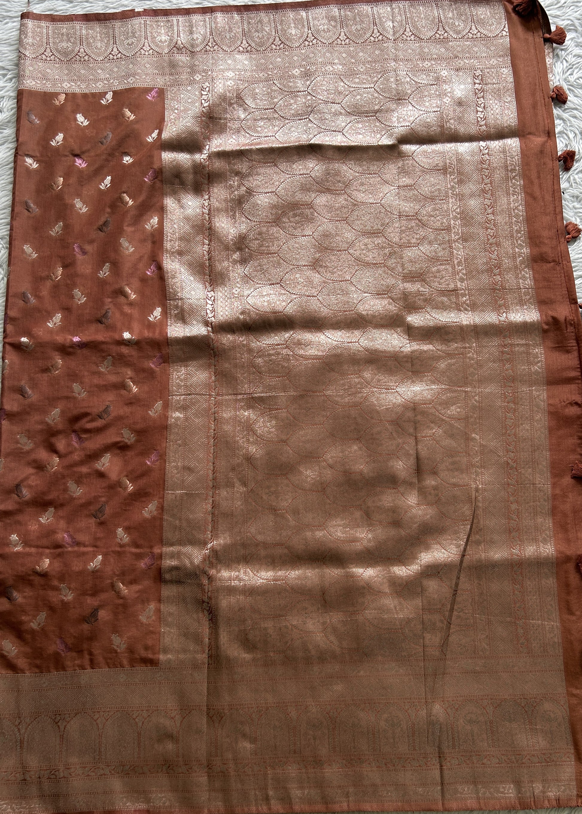 Semi Georgette Saree Brown Colored Complemented with a Zari Border. - Sampradaya Designer Studio