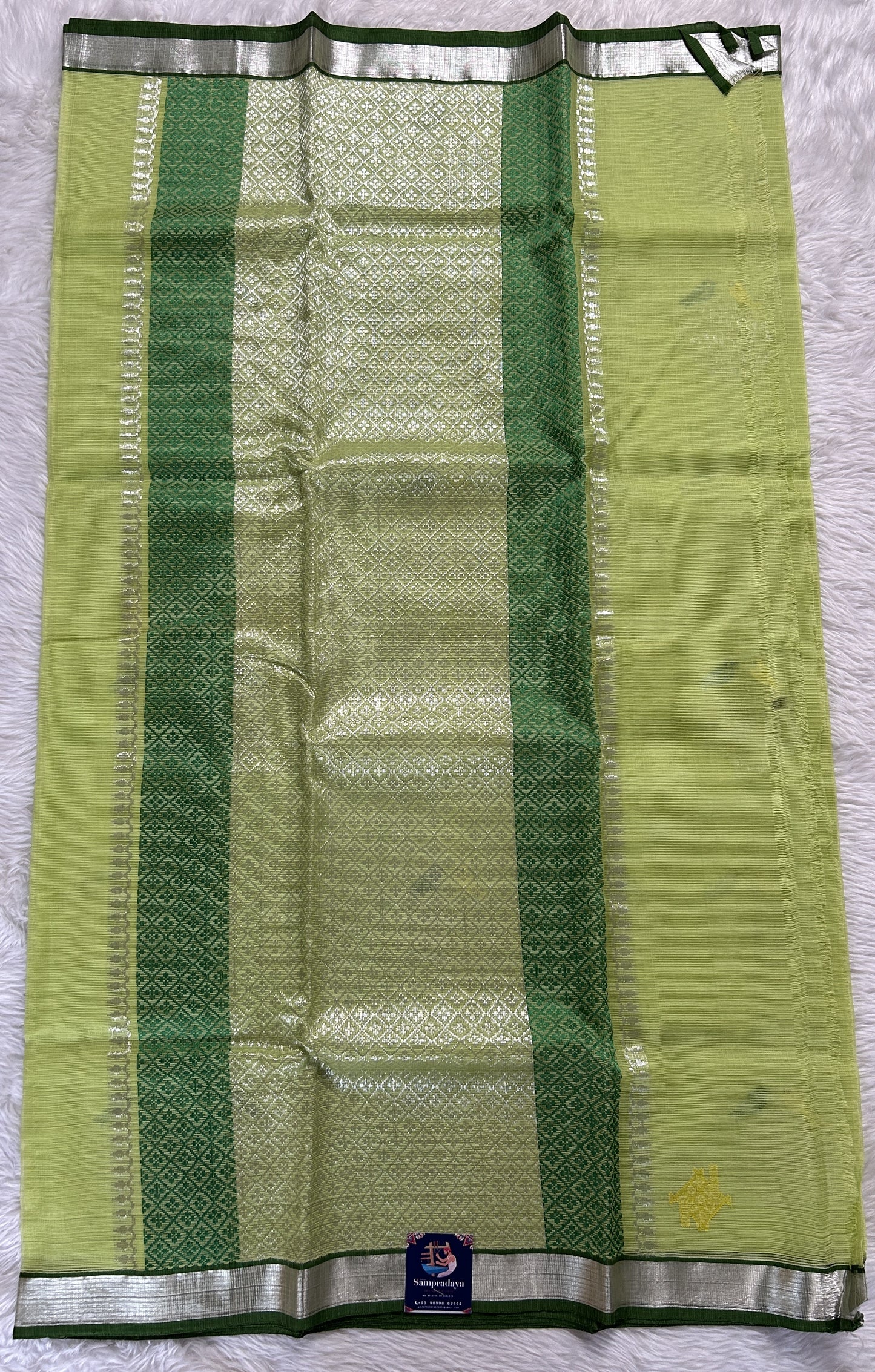 Zarikota saree Yellow Green colored Saree complemented with a Silver Zari border. - Sampradaya Designer Studio