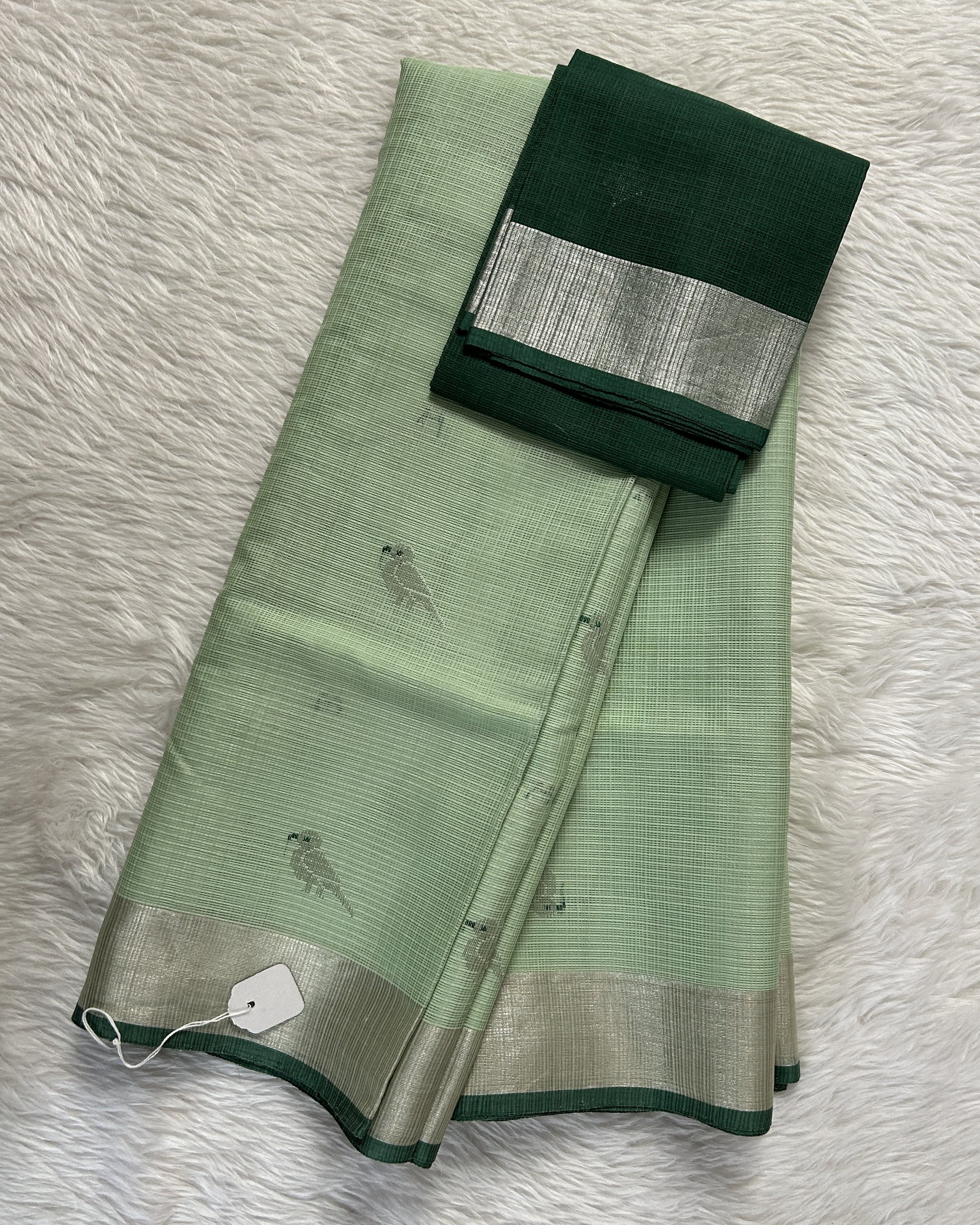 Zarikota saree Pastel Green colored Saree complemented with a Silver Zari border. - Sampradaya Designer Studio