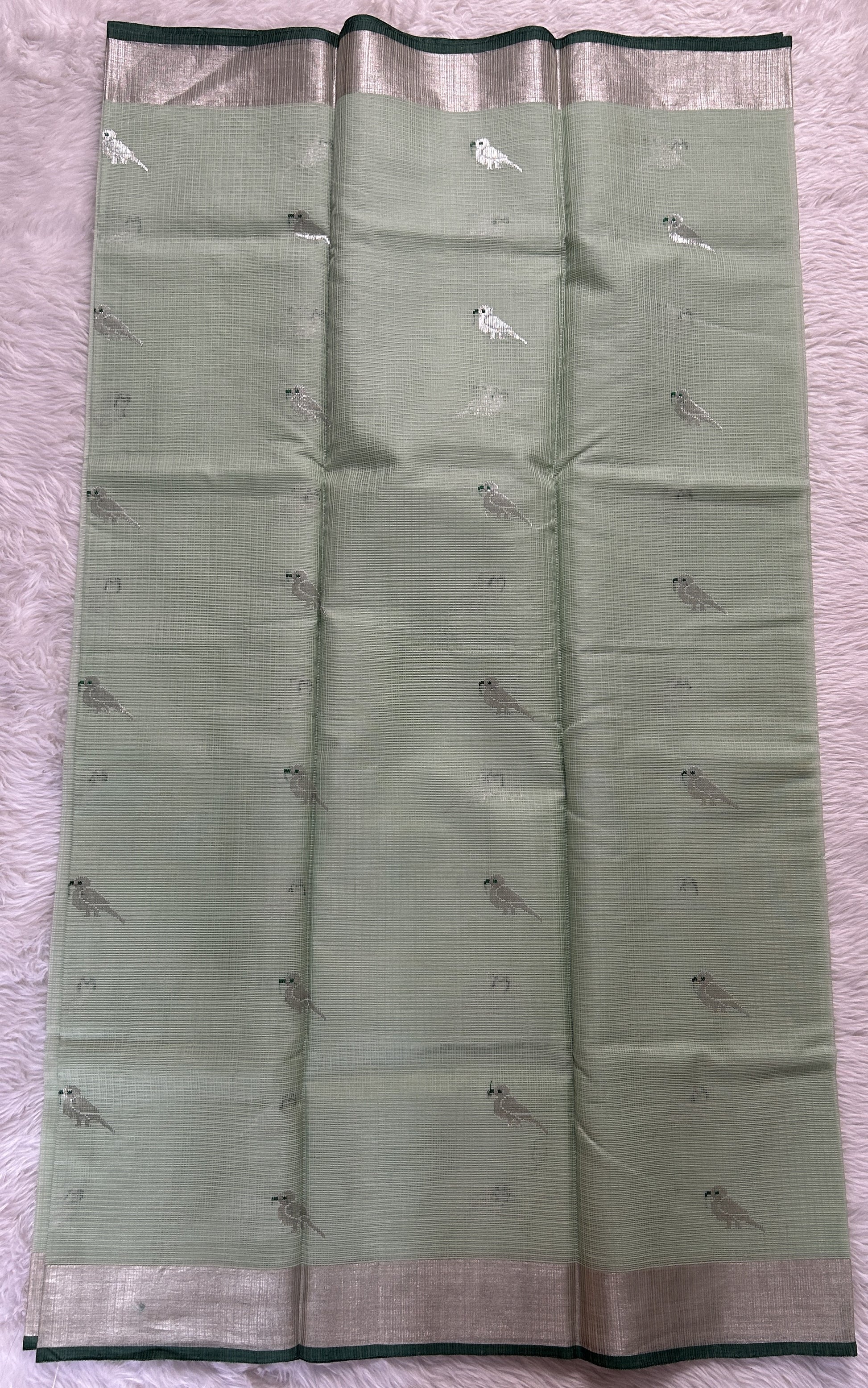 Zarikota saree Pastel Green colored Saree complemented with a Silver Zari border. - Sampradaya Designer Studio