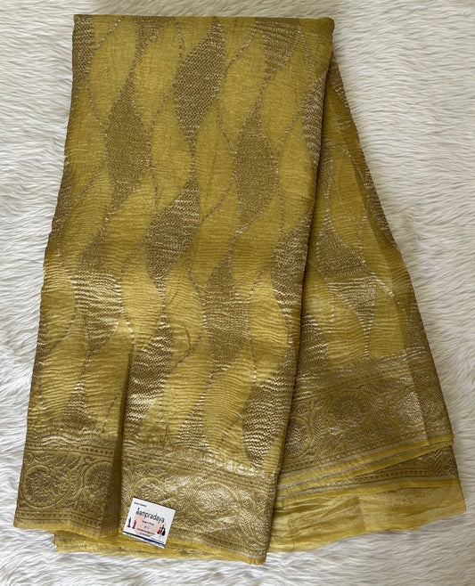 Banarasi Crushed Silk Saree Pastel Yellow colored Saree complemented with a Zari border. - Sampradaya Designer Studio