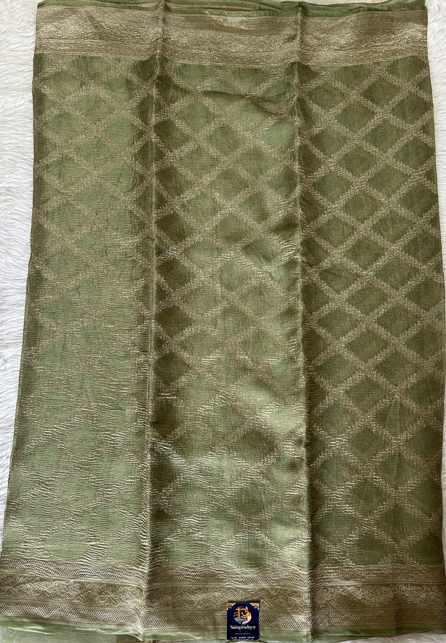 Banarasi Crushed Silk Saree Pale Light Green colored Saree complemented with a Zari border. - Sampradaya Designer Studio