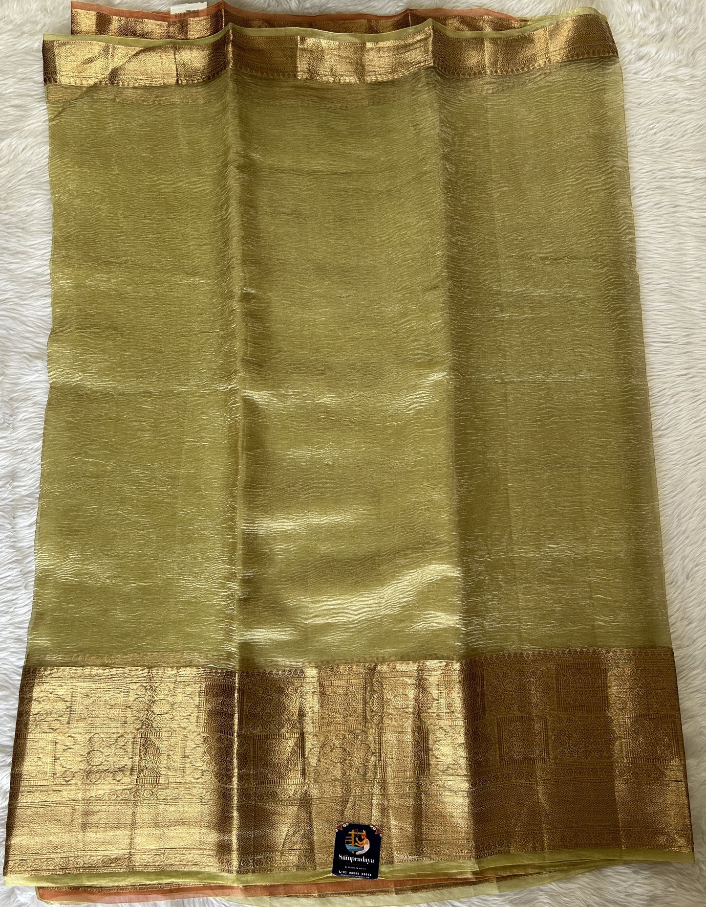 Banarasi Crushed Silk Saree Pastel Green colored Saree complemented with a Zari border. - Sampradaya Designer Studio