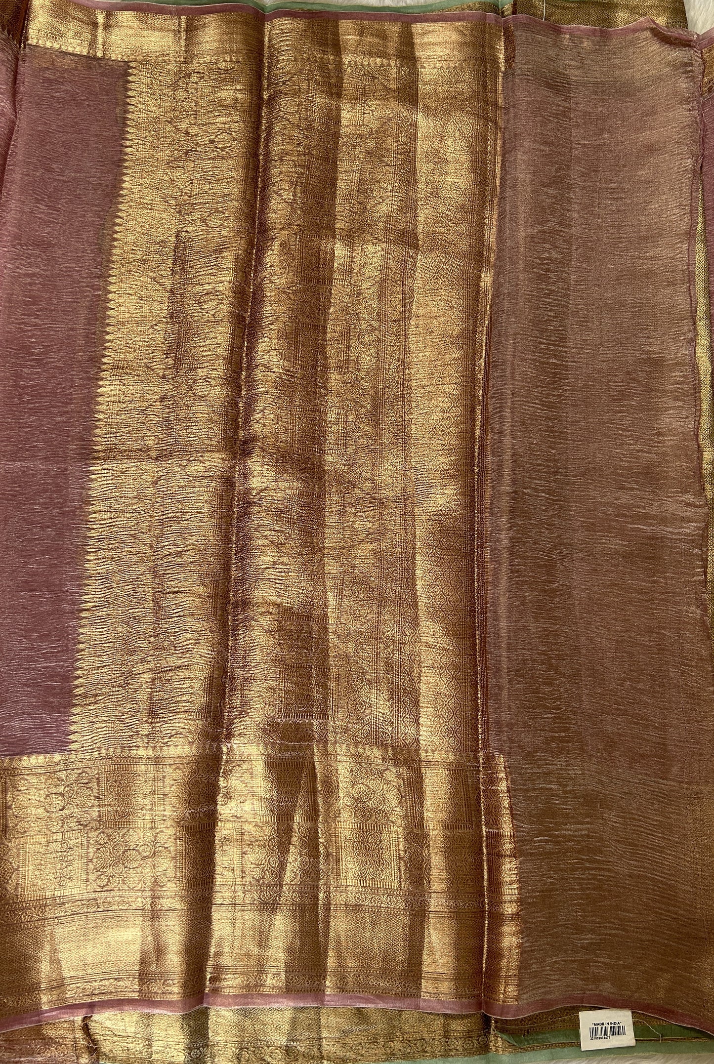 Banarasi Crushed Silk Saree Onion Pink colored Saree complemented with a Zari border. - Sampradaya Designer Studio