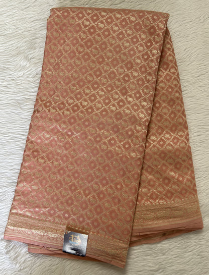 Banarasi Georgette Silk Saree Peach colored Saree complemented with a Light Gold Zari border. - Sampradaya Designer Studio