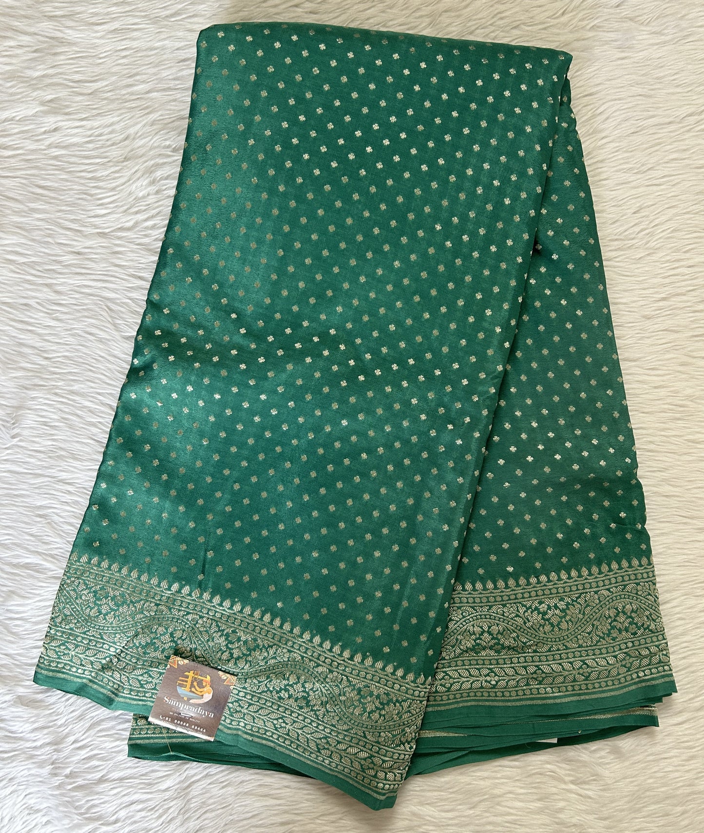 Banarasi Georgette Silk Saree Sea Green colored Saree complemented with a Light Gold Zari border. - Sampradaya Designer Studio