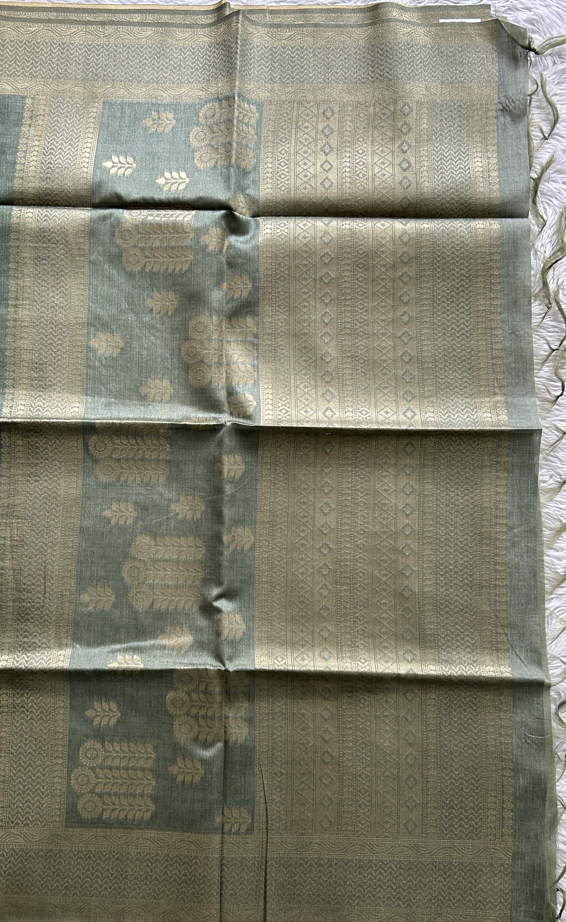 Semi Tussar Saree Olive Green Colored complemented with a Borderless. - Sampradaya Designer Studio