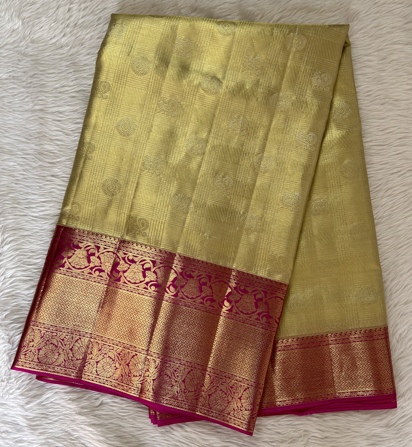 Kanjivaram Bridal Silk Saree Cream colored Saree complemented with a Pink Colored Kanchi border. - Sampradaya Designer Studio