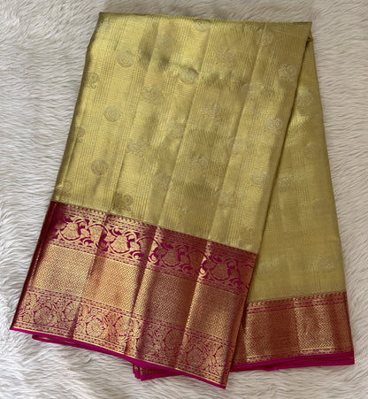 Kanjivaram Bridal Silk Saree Cream colored Saree complemented with a Pink Colored Kanchi border. - Sampradaya Designer Studio