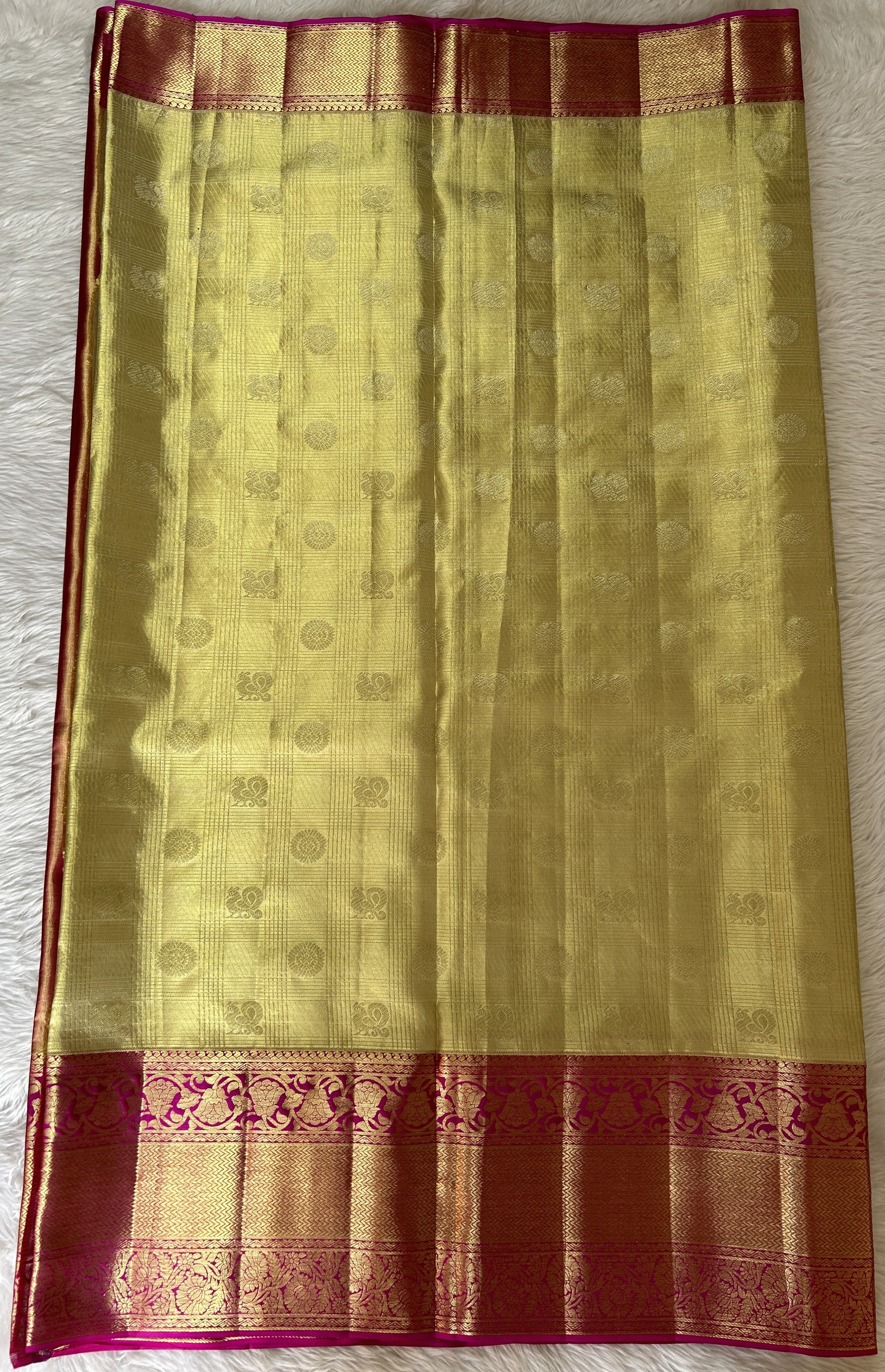 Kanjivaram Bridal Silk Saree Cream colored Saree complemented with a Pink Colored Kanchi border. - Sampradaya Designer Studio