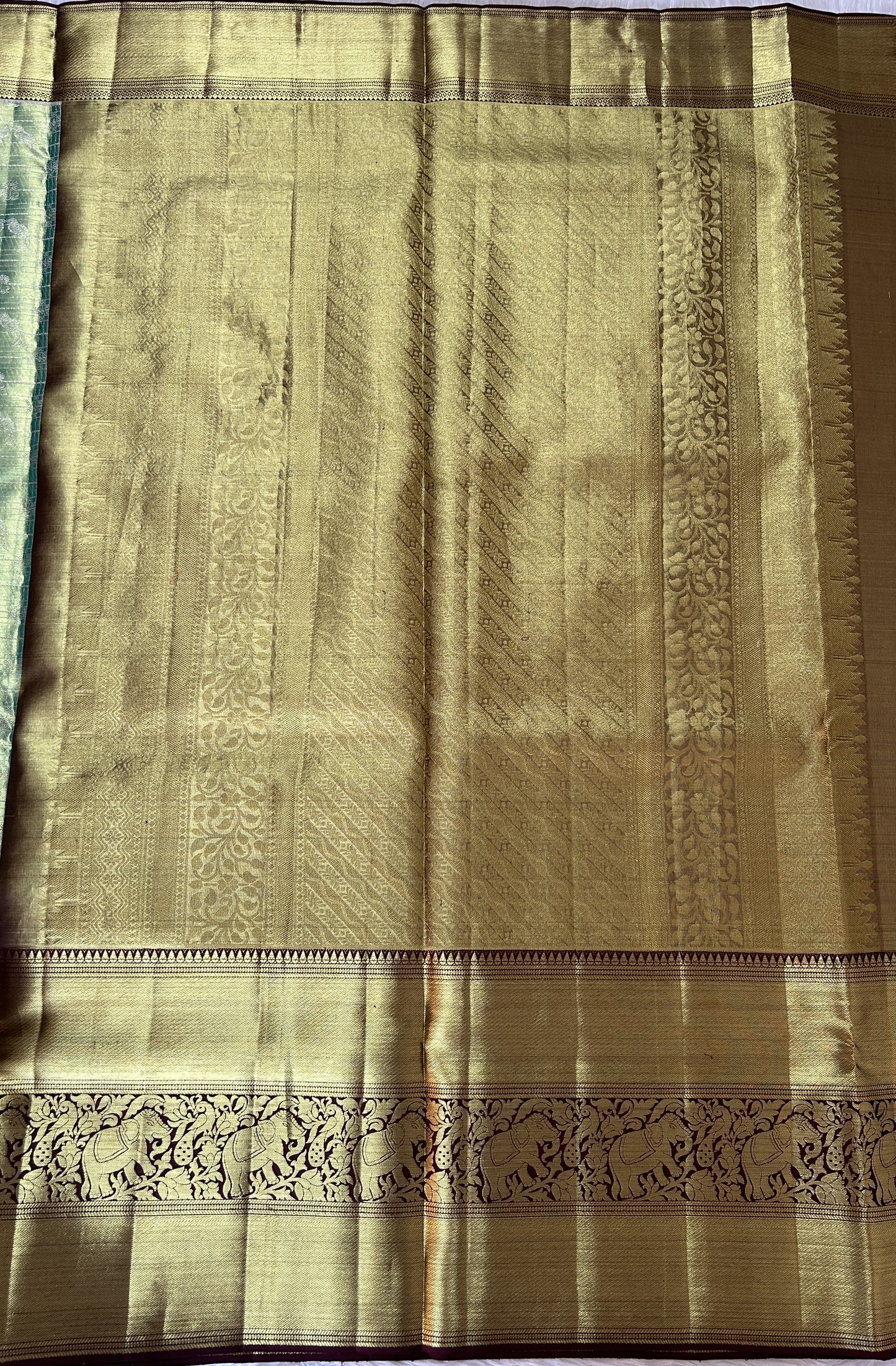 Kanjivaram Bridal Silk Saree Pastel Green colored Saree complemented with a Brown Colored Kanchi border. - Sampradaya Designer Studio