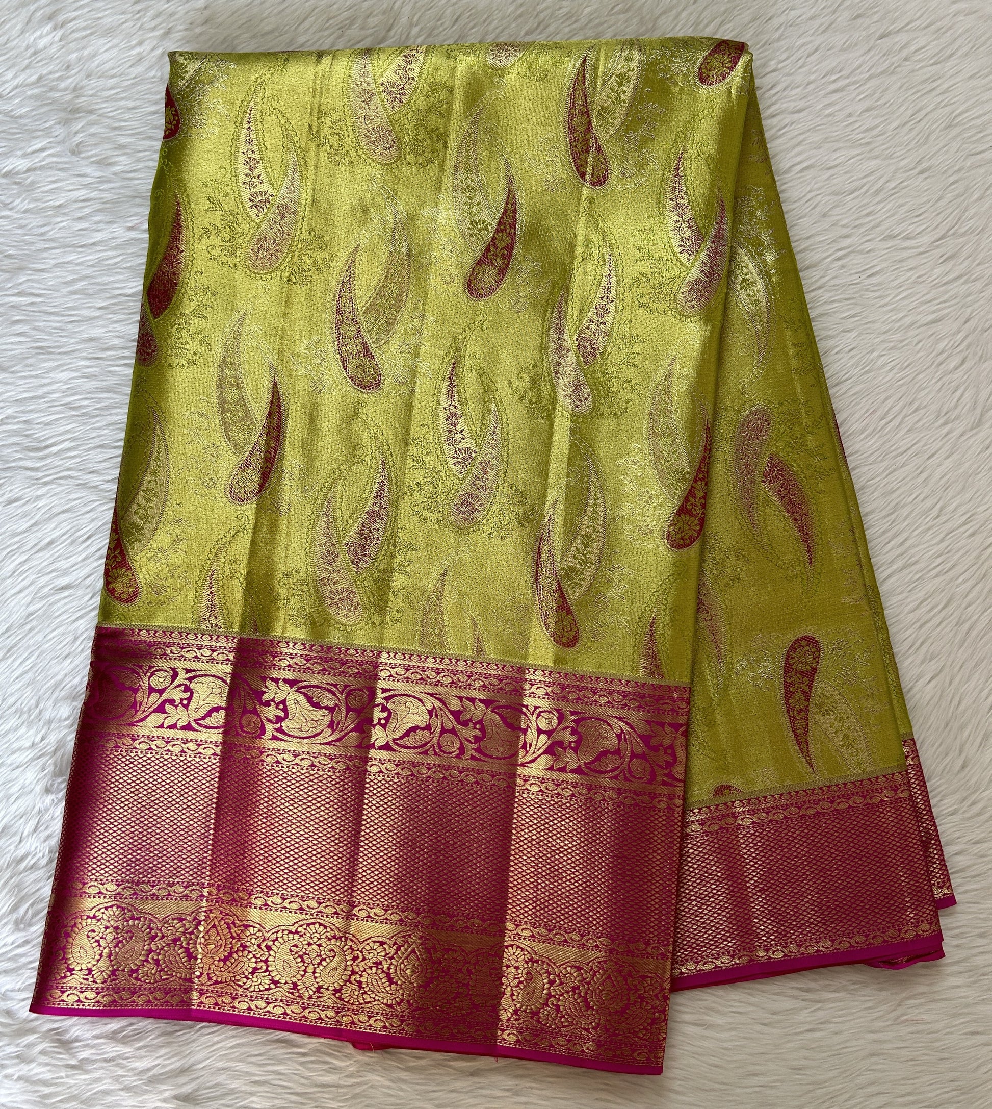 Kanjivaram Bridal Silk Saree Parrot Green colored Saree complemented with a Pink Colored Kanchi border. - Sampradaya Designer Studio