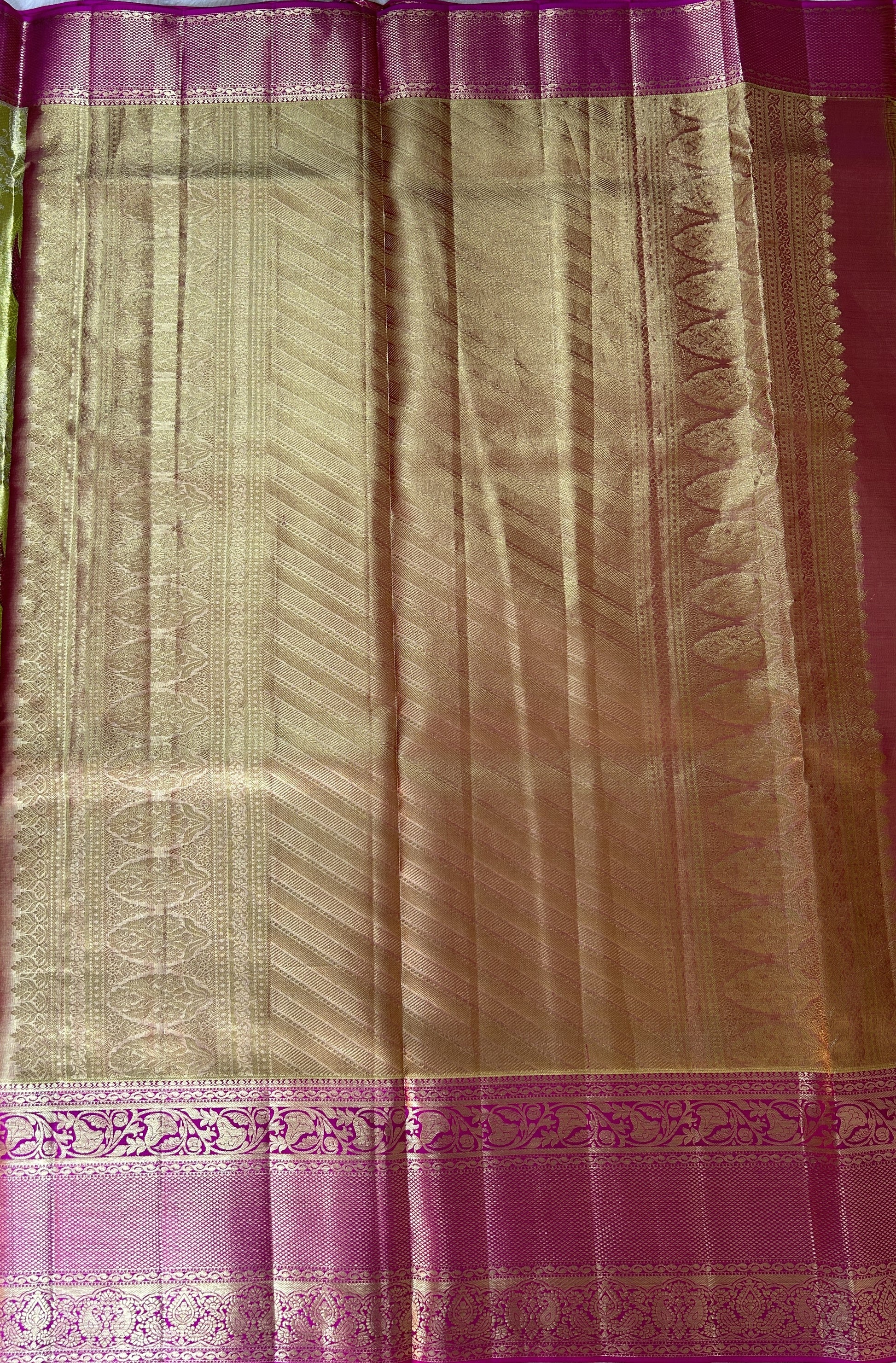 Kanjivaram Bridal Silk Saree Parrot Green colored Saree complemented with a Pink Colored Kanchi border. - Sampradaya Designer Studio