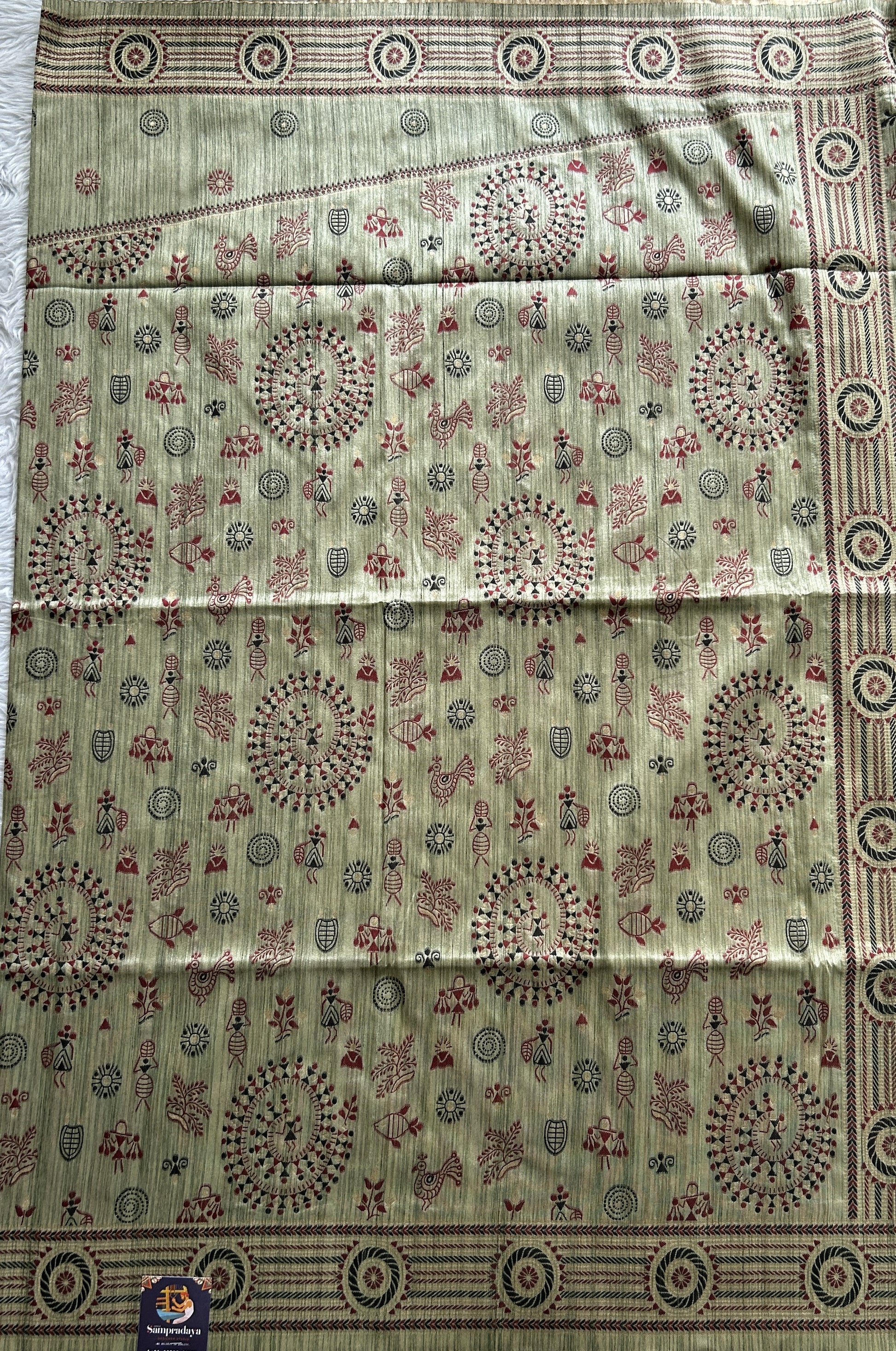 Semi Tussar Saree Light Olive Green Colored complemented with a Zari Border. - Sampradaya Designer Studio