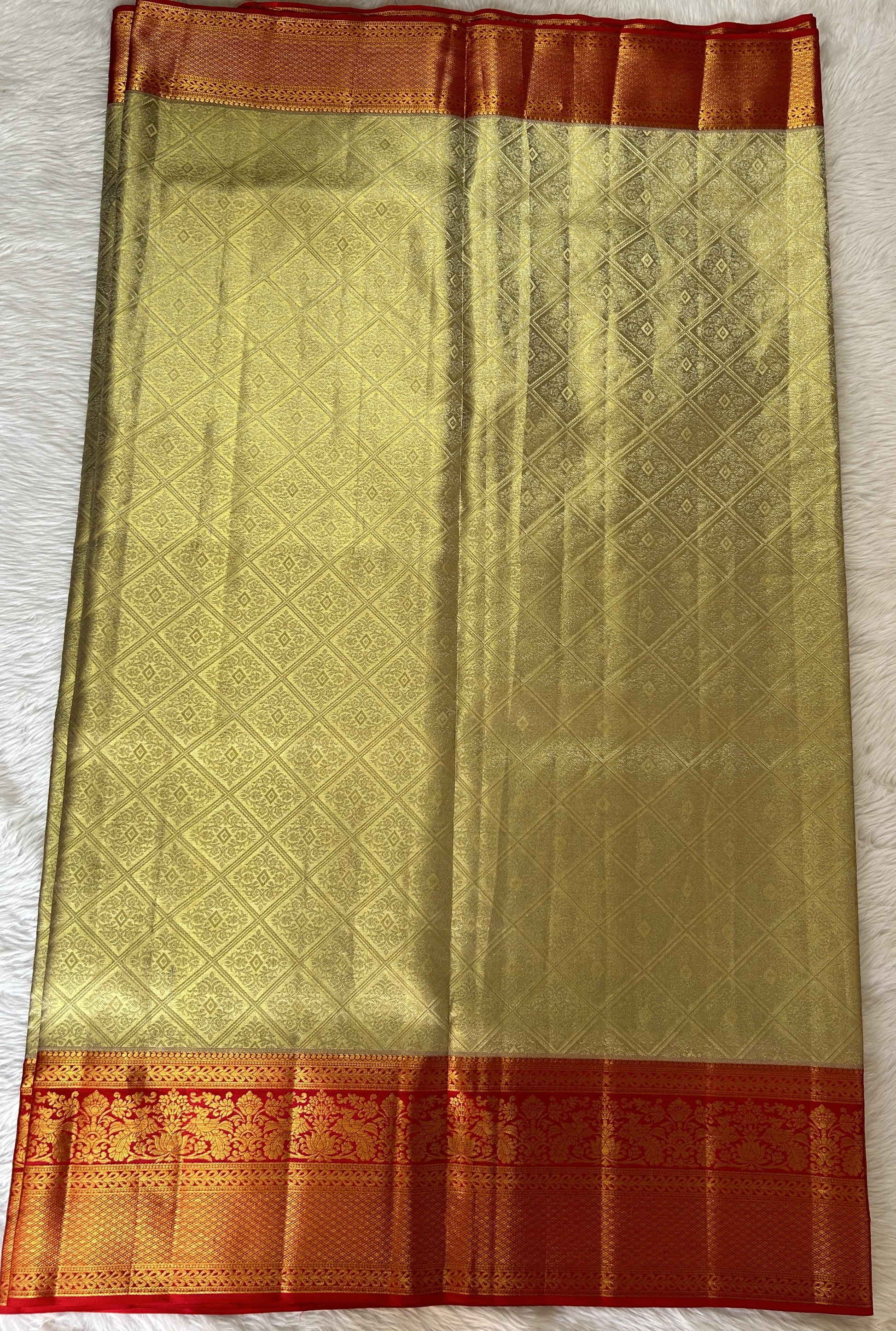 Kanjivaram Bridal Silk Saree Cream colored Saree complemented with a Red Colored Kanchi border. - Sampradaya Designer Studio