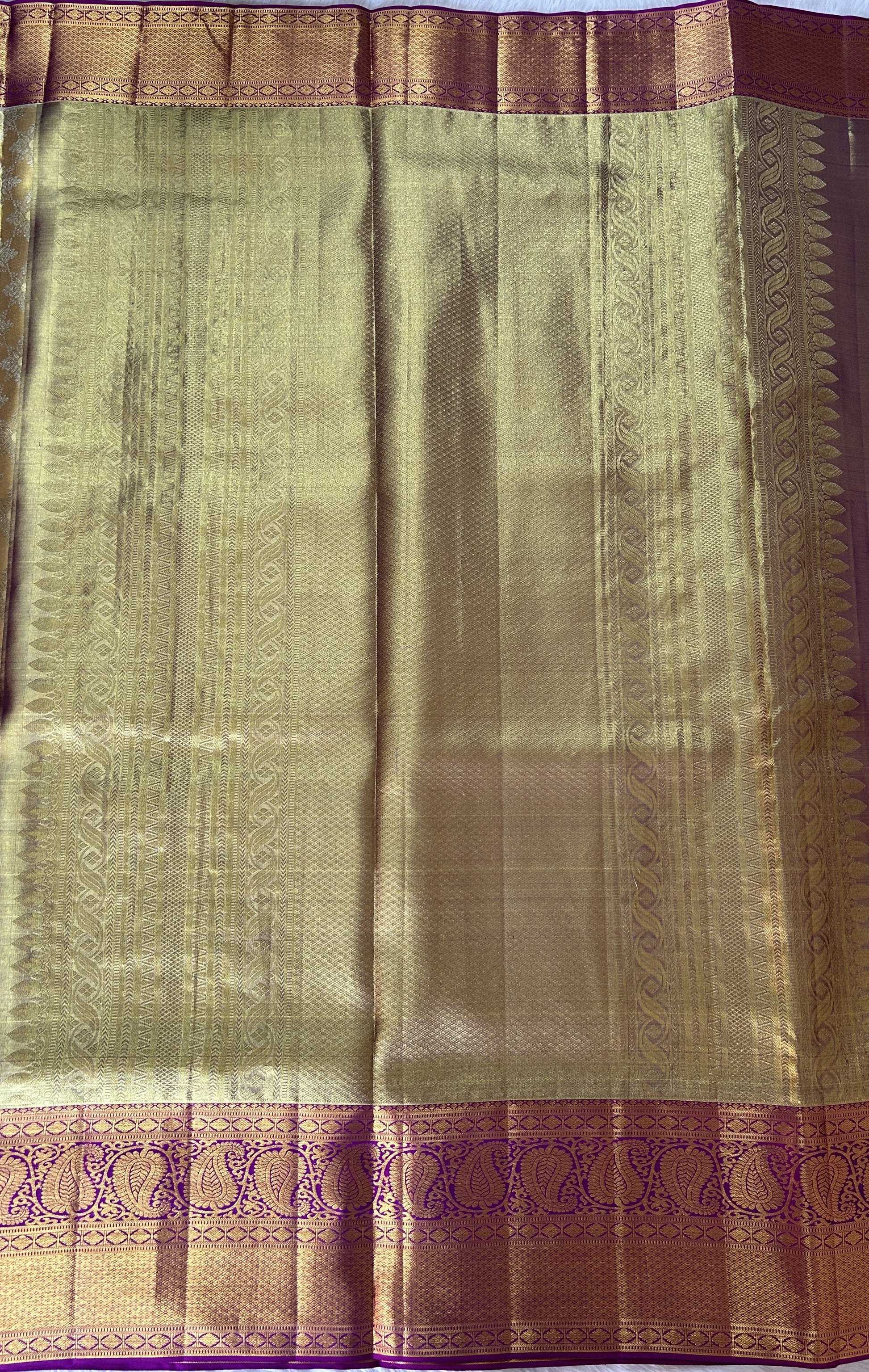 Kanjivaram Bridal Silk Saree Gold colored Saree complemented with a Purple Colored Kanchi border. - Sampradaya Designer Studio