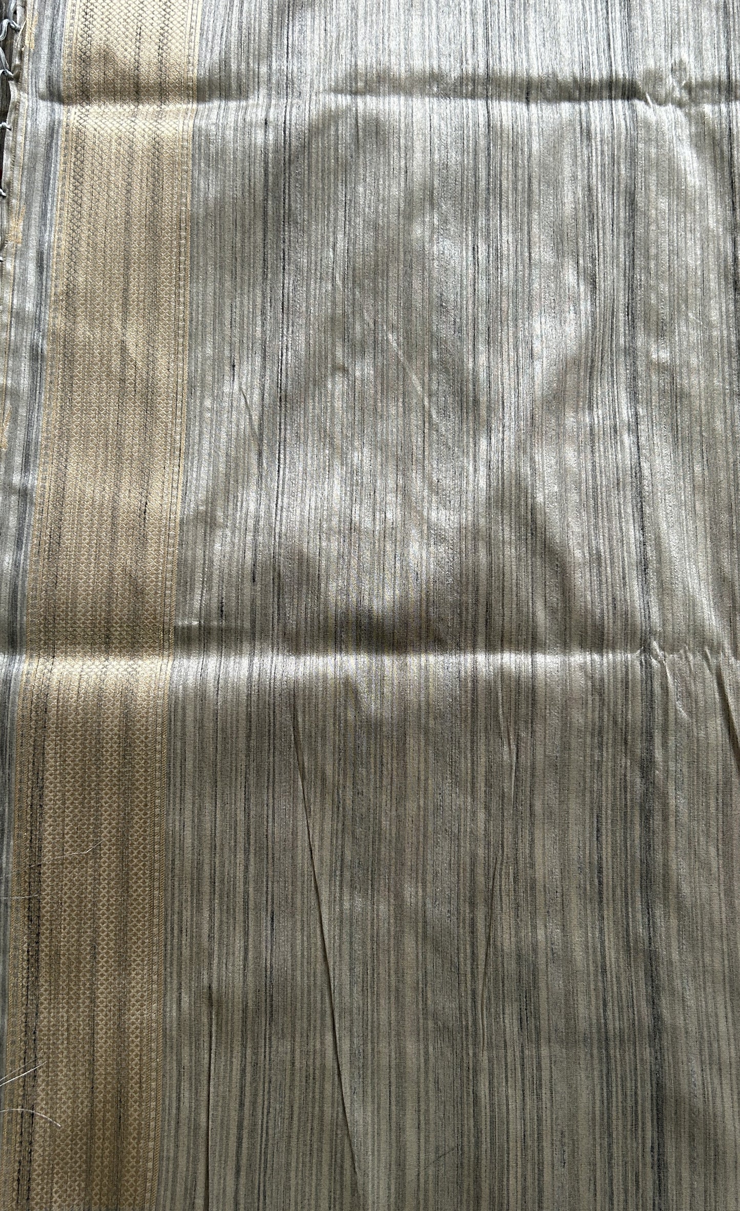 Semi Tussar Saree Gray Colored complemented with a Zari Border. - Sampradaya Designer Studio