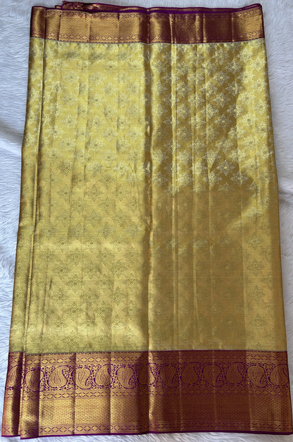 Kanjivaram Bridal Silk Saree Gold colored Saree complemented with a Purple Colored Kanchi border. - Sampradaya Designer Studio