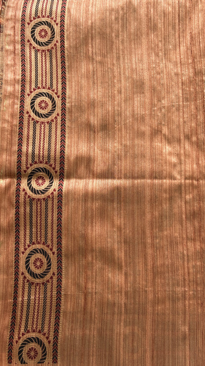 Semi Tussar Saree Dark Peach Colored complemented with a Zari Border. - Sampradaya Designer Studio