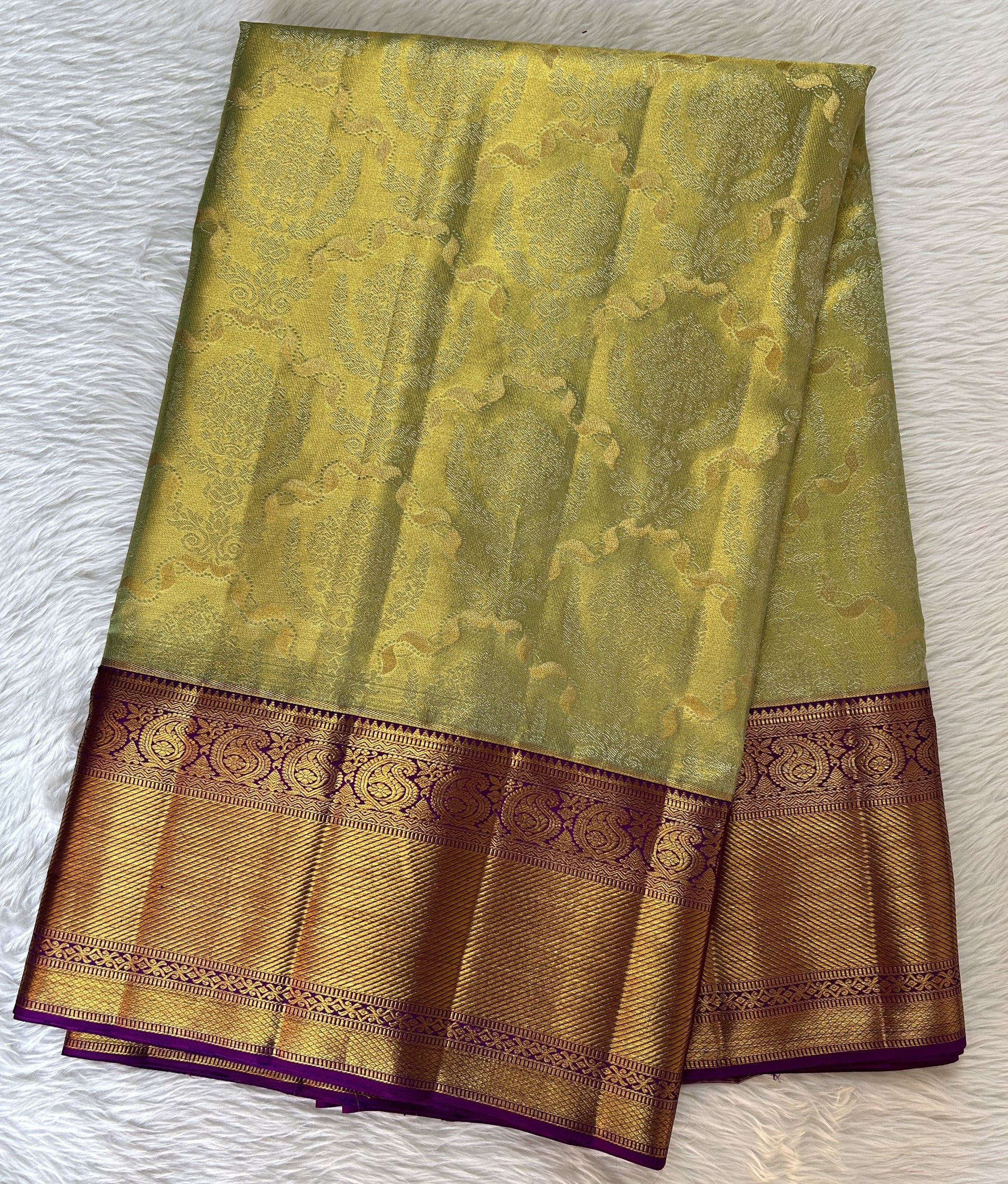 Kanjivaram Bridal Silk Saree Pastel Green colored Saree complemented with a Purple Colored Kanchi border. - Sampradaya Designer Studio