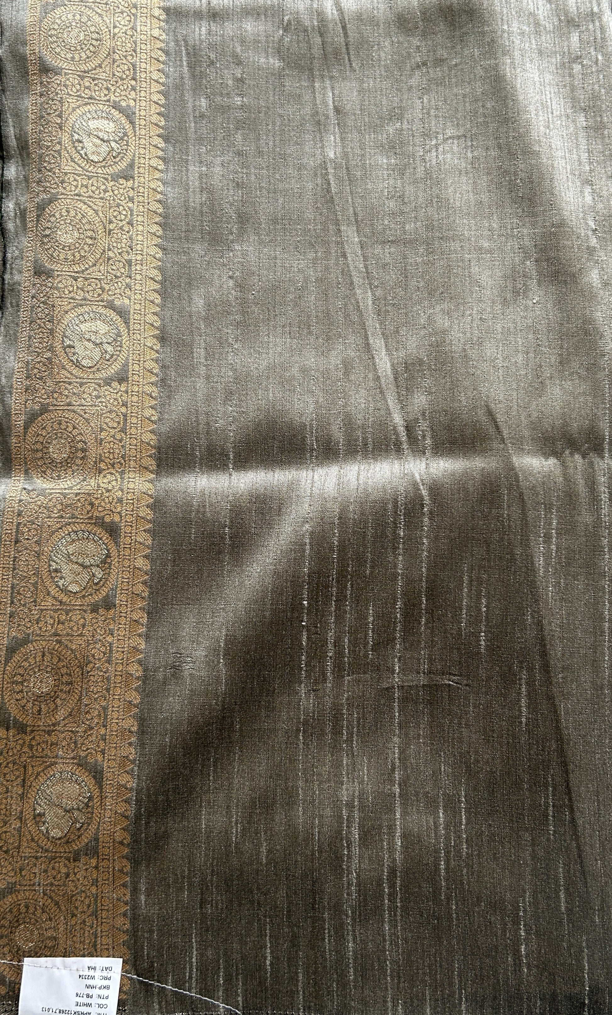 Semi Tussar Saree Gray Colored complemented with a Zari Border. - Sampradaya Designer Studio