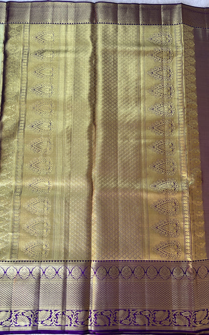 Kanjivaram Bridal Silk Saree Parrot Green colored Saree complemented with a Purple Colored Gold Kanchi border. - Sampradaya Designer Studio