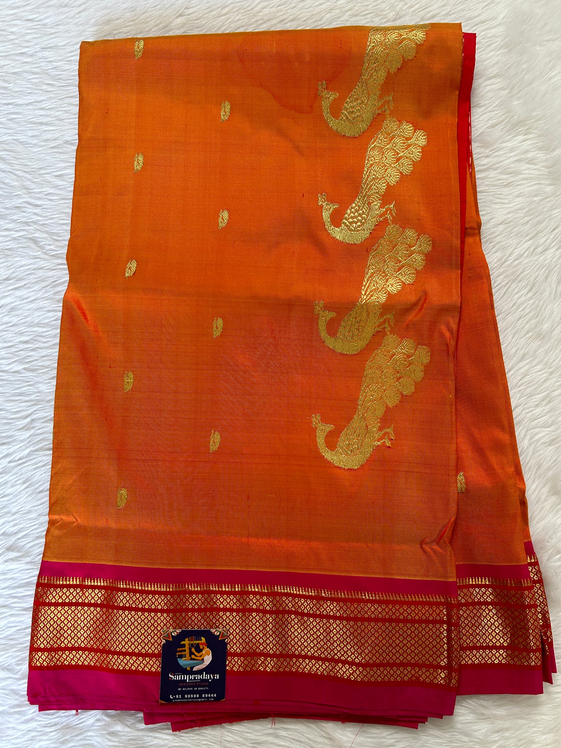 Paithani Silk Saree Orange Colored Complemented With a Pink Colored Irkal Border - Sampradaya Designer Studio