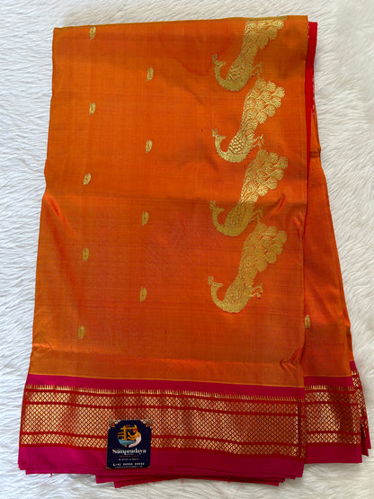 Paithani Silk Saree Orange Colored Complemented With a Pink Colored Irkal Border - Sampradaya Designer Studio