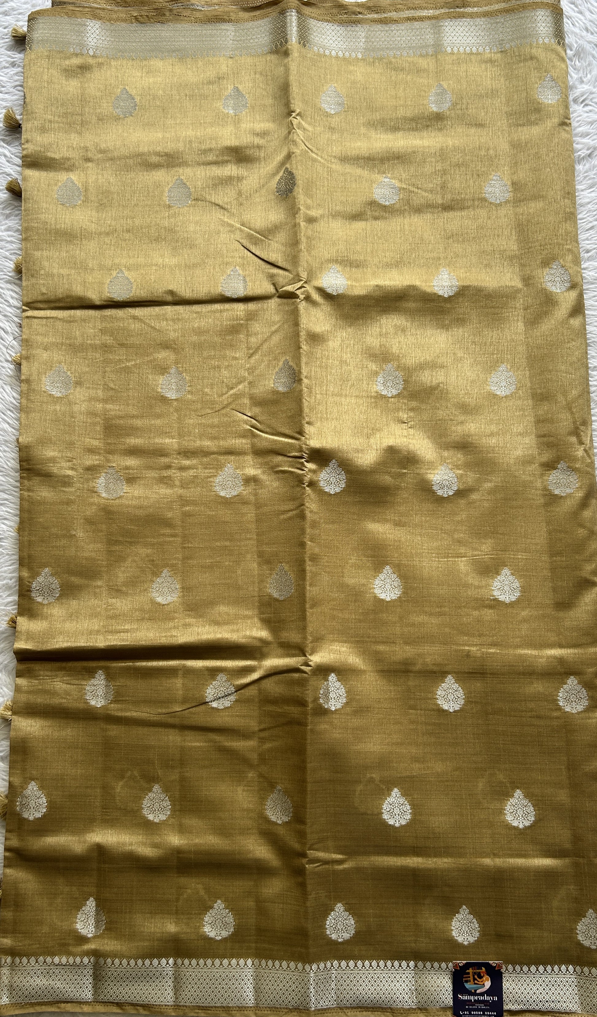 Semi Tussar Saree Cream Colored Complemented with a Zari Border. - Sampradaya Designer Studio