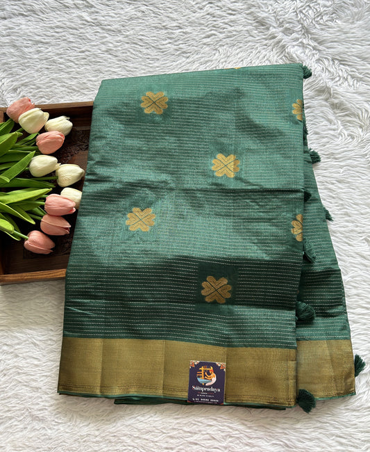 Semi Tussar Saree Bottle Green Colored Complemented with a Zari Border. - Sampradaya Designer Studio