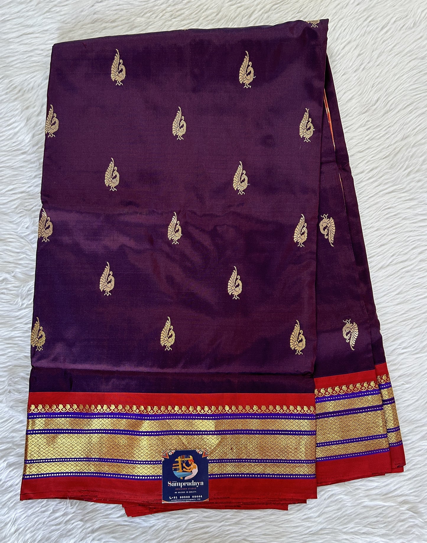 Paithani Silk Saree Grape Colored Saree Complemented With a Dark Red Colored Irkal Border - Sampradaya Designer Studio