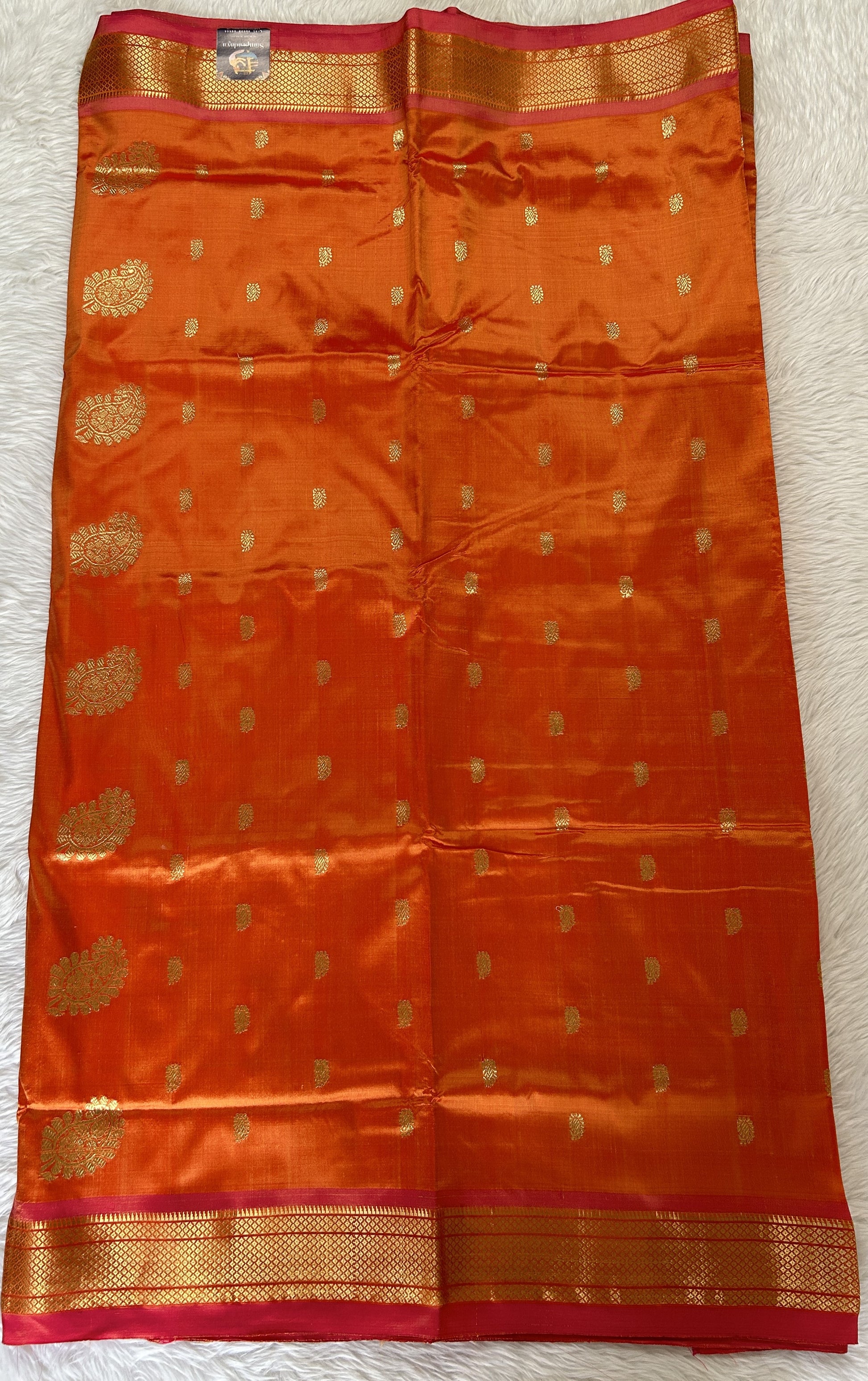 Paithani Silk Saree Orange Colored Complemented With a Pink Colored Irkal Border - Sampradaya Designer Studio