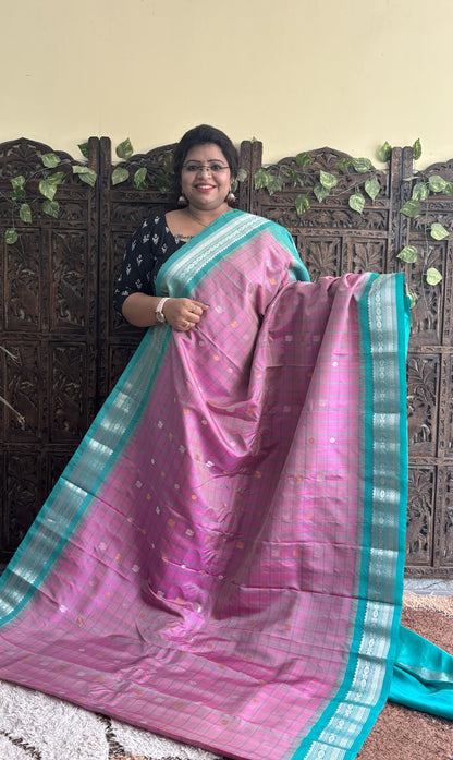 Gadwal Silk Saree Pink Colored Complemented With a Sea Green Zari Border