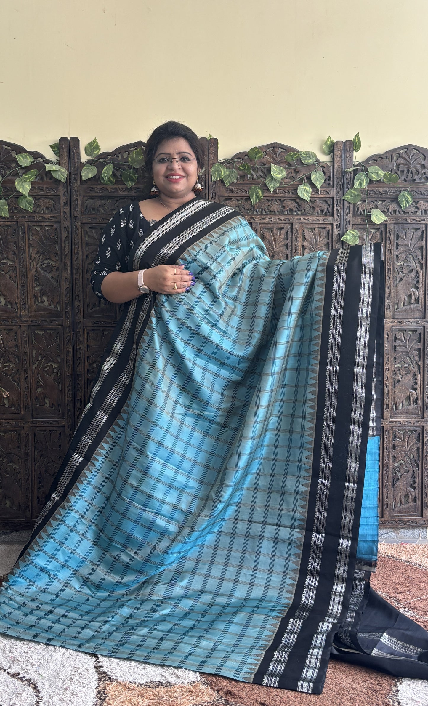 Gadwal Silk Saree Sea Blue Colored Complemented With a Black Zari Gap Border