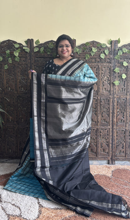 Gadwal Silk Saree Sea Blue Colored Complemented With a Black Zari Gap Border