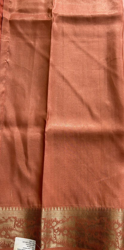 Banarasi Soft Silk Saree Peach Colored Complemented with a Zari Border. - Sampradaya Designer Studio