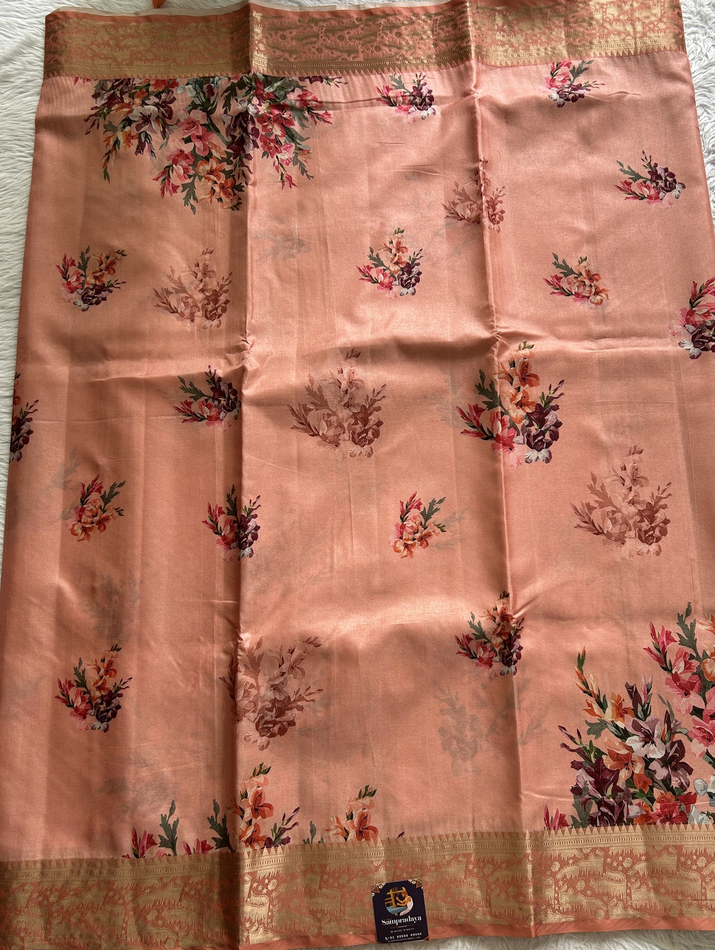 Banarasi Soft Silk Saree Peach Colored Complemented with a Zari Border. - Sampradaya Designer Studio