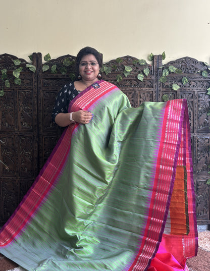 Gadwal Silk Saree Light Green Colored Complemented With a Pink Zari Border