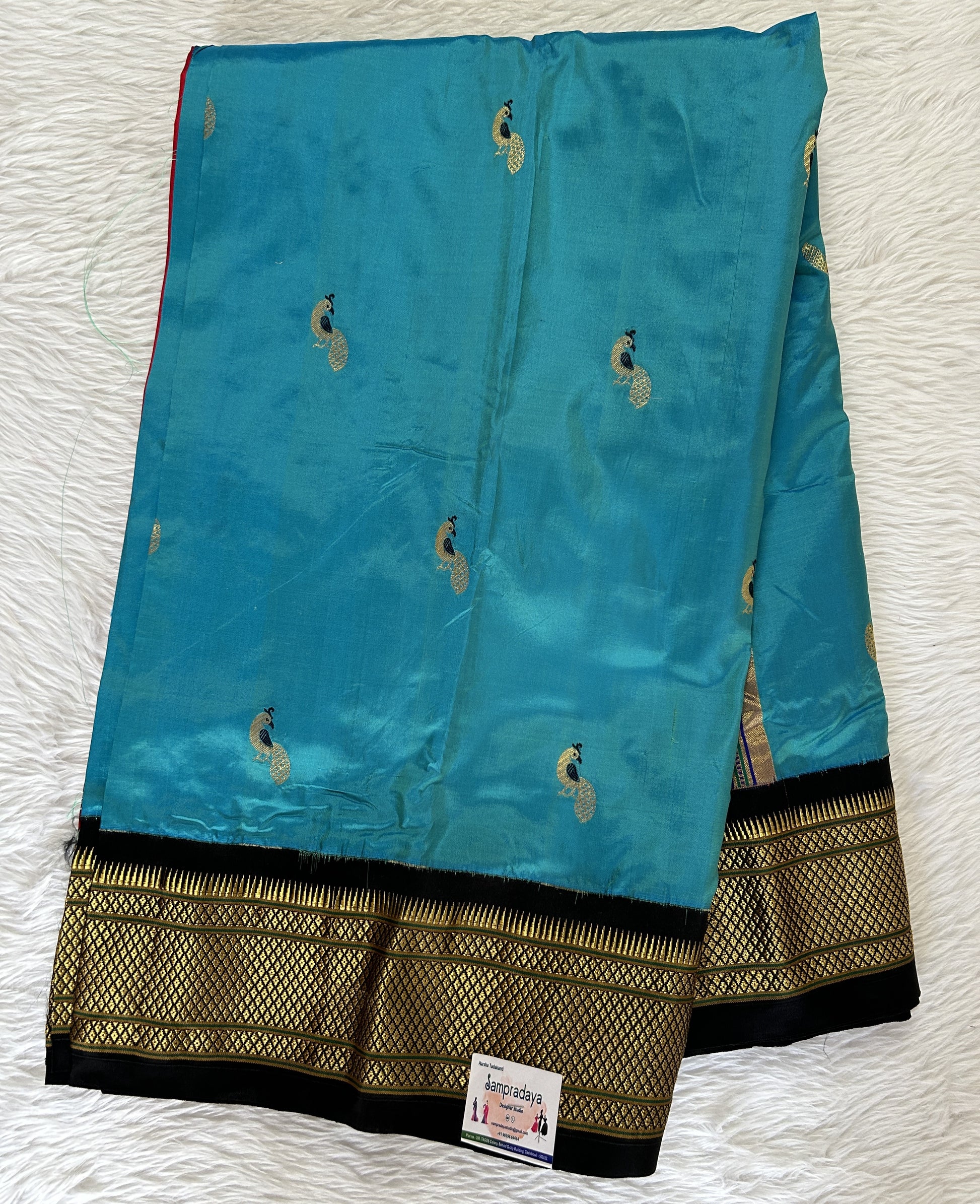 Paithani Silk Saree Sky Blue Colored Complemented With a Black Colored Irkal Border - Sampradaya Designer Studio