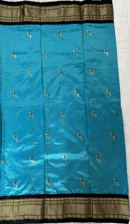 Paithani Silk Saree Sky Blue Colored Complemented With a Black Colored Irkal Border - Sampradaya Designer Studio