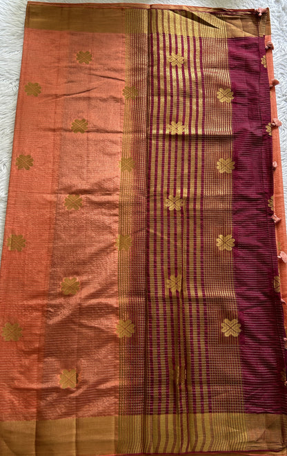 Semi Tussar Saree Pastel Orange Colored Complemented with a Zari Border. - Sampradaya Designer Studio