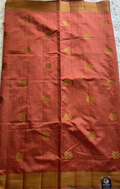 Semi Tussar Saree Peach Colored Complemented with a Zari Border. - Sampradaya Designer Studio