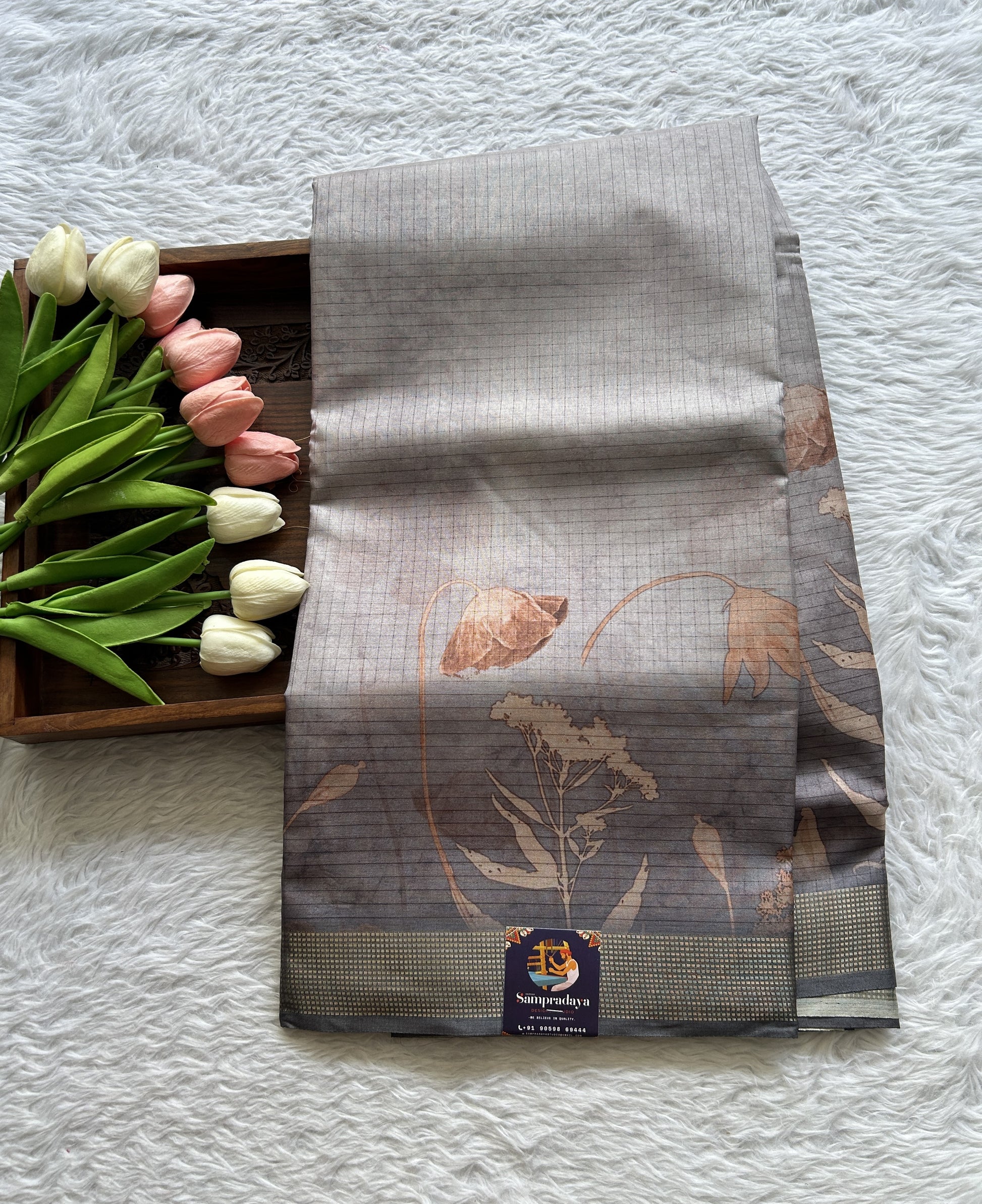 Semi Tussar Saree Gray Colored complemented with a Zari Border. - Sampradaya Designer Studio