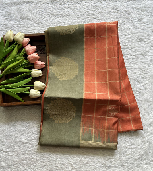 Semi Tussar Saree Orange Colored complemented with a Olive Green Color Buti Border. - Sampradaya Designer Studio